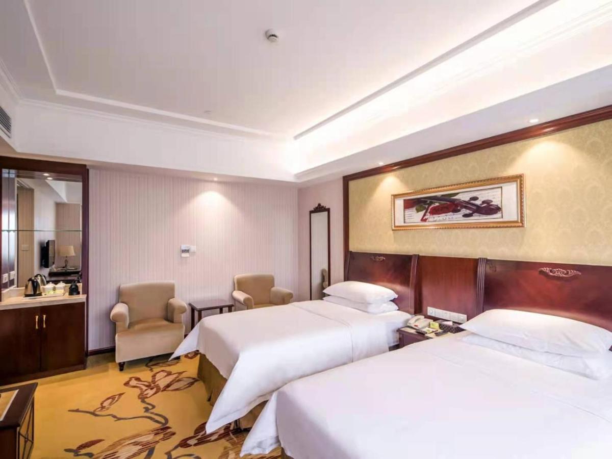 Vienna International Hotel Shanghai Pudong Xiupu Road Exterior photo